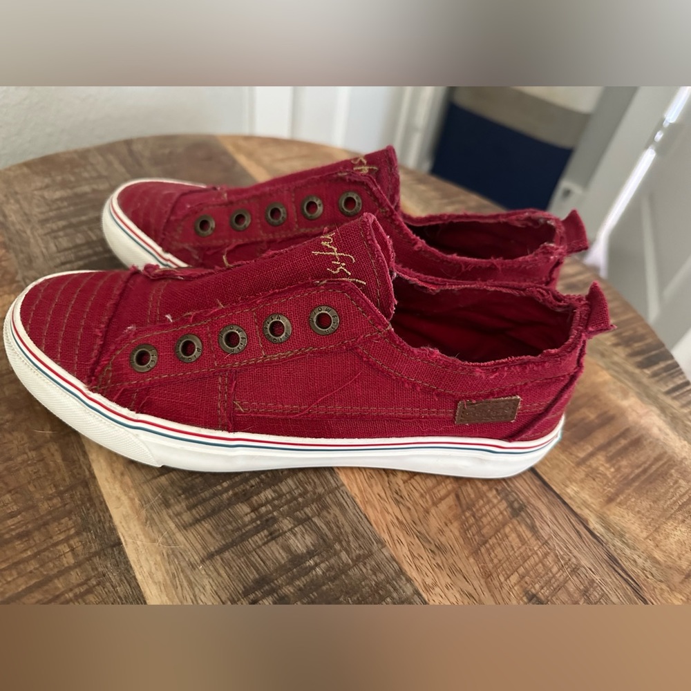 Women’s beautiful red sneakers. Barely worn, like new, true to size
